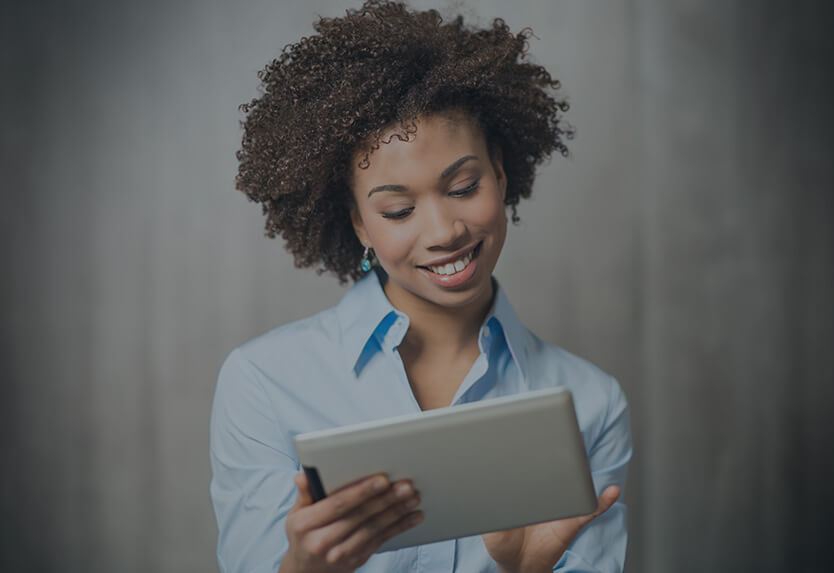 The brown hair girl with ipad